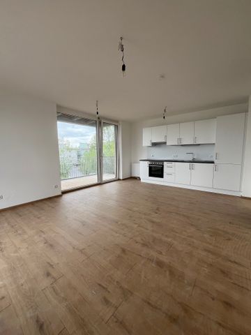 Lichtdurchflutete 3-Zimmer-Wohnung mit Küche, Balkon und Tiefgaragenplatz - Photo 4