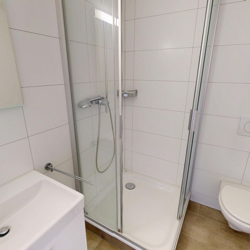 Moderne 1.5 Zimmer-Wohnung an zentraler Lage - Foto 1