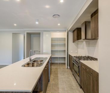 Large Modern Family Home in Everleigh Estate - Photo 6