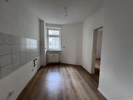 Urbanes Wohnvergnügen: Geschmackvoll renovierte 3-Zimmer-Wohnung mit Balkon! - Foto 5