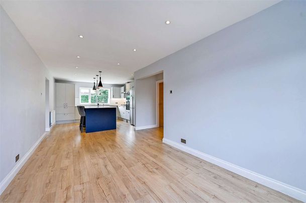 This beautifully refurbished 5/6-bedroom detached home is set in a quiet spot with stunning Chiltern Hills views, offering spacious, light-filled accommodation finished to a high standard. - Photo 1