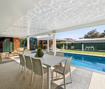 Open the door to resort-style living, close to everything that matters - Photo 1