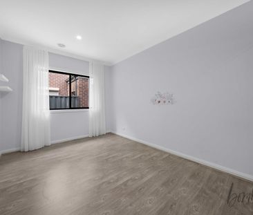 Modern, Low-Maintenance Living in a Secure & Stylish Home - Photo 3