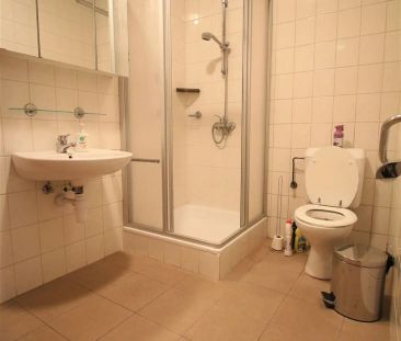 Gelijkvloersappartement met 1 slaapkamer en tuin in centrum Merksem - Photo 2