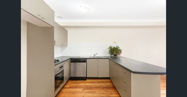 Two Bedroom Townhouse Designed for Easycare Entertaining - Photo 1