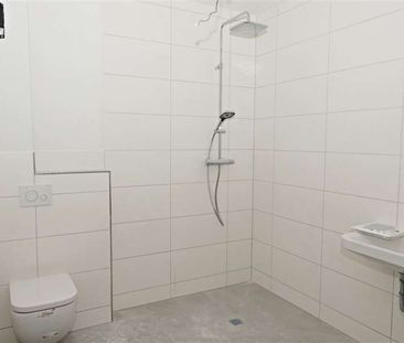 Moderne Neubauwohnung mit Balkon in guter Lage von Schortens! - Photo 2