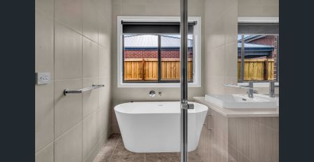 Modern 4-Bedroom Family Home in Prime Tarneit Place Estate Location - Photo 3