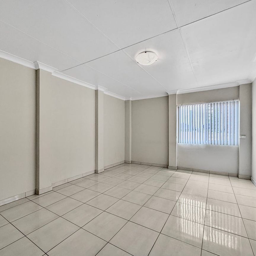 NEAT & LOW-MAINTENANCE FLAT IN GREAT LOCATION - Photo 1