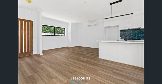 Luxurious Low-Maintenance Living in a Blue-Chip location! - Photo 1