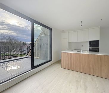 Nieuwbouw penthouse met 2 terrassen pal in het centrum - Photo 4