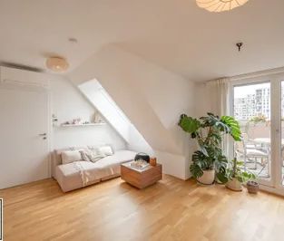 Helle 2-Zimmer-DG-Wohnung im jungen Neubau mit Westterrasse & Klima... - Foto 1