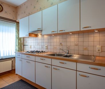 Verzorgd appartement op de gelijkvloerse verdieping met garagebox! - Foto 5