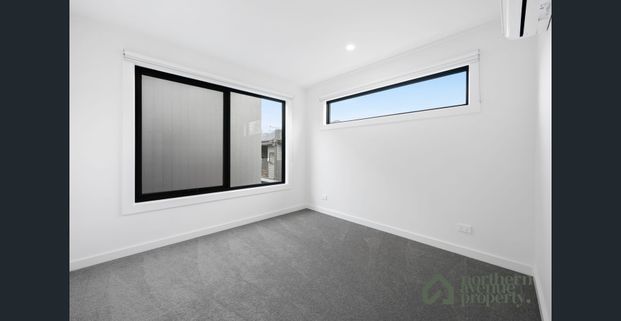 Stunning Brand New Townhouse with Stylish Reverse Living - Photo 1