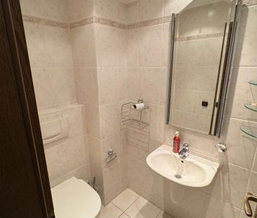 Modernisierte, lichtdurchflutete Erdgeschosswohnung mit Wintergarte... - Foto 6