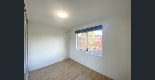 Renovated Unit in Central Location - Photo 1