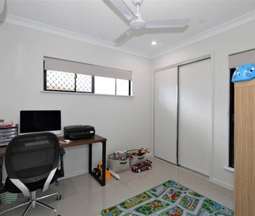 Modern Four-Bedroom Family Home in Prime Location - Photo 5