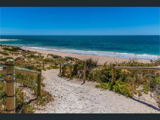 Coastal Charm Meets Convenience - Photo 1