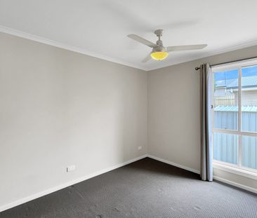 Three Bedroom Home with Low Maintenance Living - Photo 5