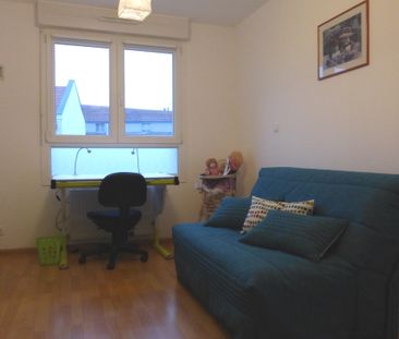 Location Appartement HUNINGUE 840 € CC - Photo 1