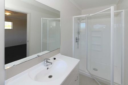 Discover comfortable, modern living in this near-new four-bedroom home, perfectly designed for easy living and effortless entertaining. - Photo 5