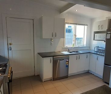 Spacious Five-Bedroom Home in the Heart of Newtown - Photo 4