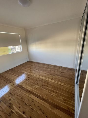 Fully Renovated Apartment in the CBD - Photo 3