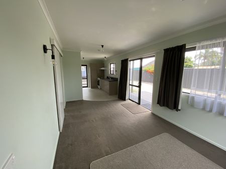 Built in 2010, this tidy and light-filled two-bedroom cottage offers comfortable, low-maintenance living. - Photo 2