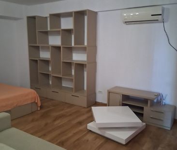 Ofer spre închiriere garsonieră în zona Unirii-Camera de Comerț - Photo 2