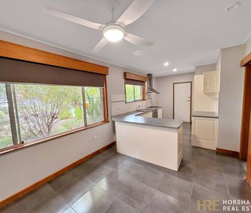 Modern 4-Bedroom Home Near the River - Photo 6