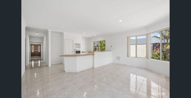 Spacious, Light-Filled Living in the Heart of Manning! - Photo 1