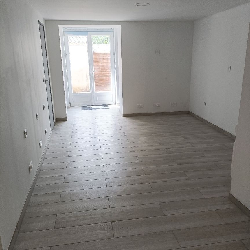 Un appartement en rez-de-chaussée - ANICHE - Photo 1