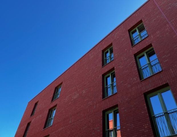 Erstbezug im neuen Stadtteil Kronsrode Hannover: EBK, Fußbodenheizung, Balkon, E-Lademöglichkeiten u.v.m. - Photo 1