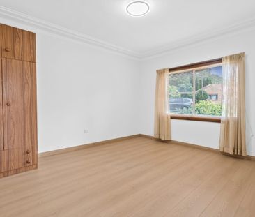 Expansive Five-Bedroom Home with Large Backyard - Photo 2