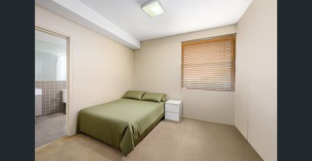 Conveniently Located Two Bedroom Apartment with Secure Parking - Photo 5