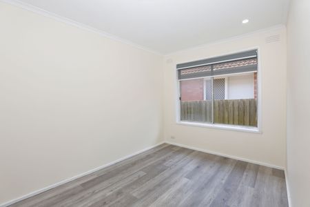 Spacious 3-Bedroom Home with Natural Light and Modern Amenities - Photo 2