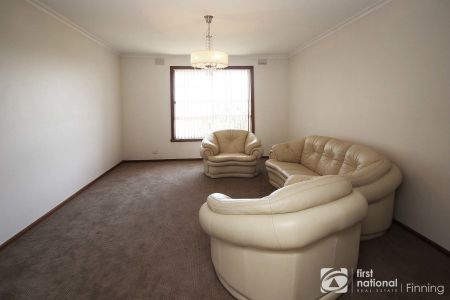 Sitting Amongst the Flowers - Photo 2