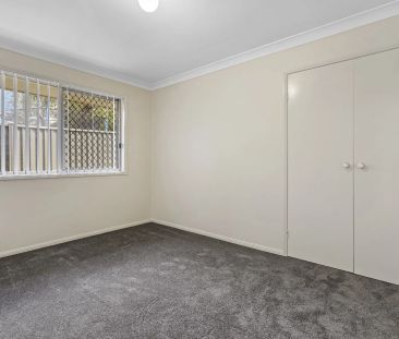 Four bedroom home with air conditioning on large block.. - Photo 6