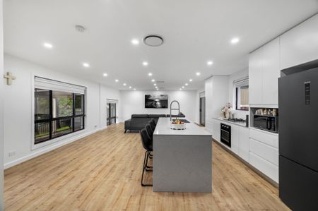 Stylish Family Living in a Peaceful Location - Photo 2