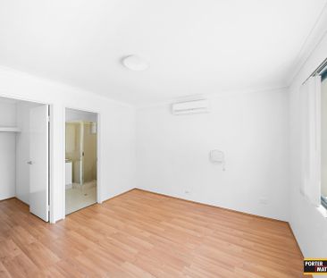 Modern Street-Front Living | Low Maintenance & Spacious Design - Photo 5