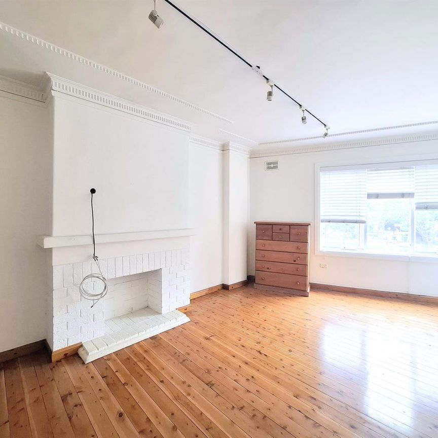 RENOVATED TWO BEDROOM UNIT WITH SUNROOM/THIRD BEDROOM - Photo 1