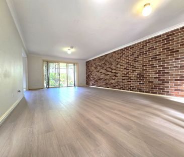 SPACIOUS FOUR BEDROOMS TOWNHOUSE with Double LUG - Photo 1