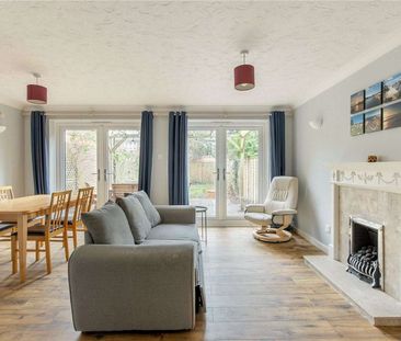 A well presented three bedroom home with garden and garage - Photo 2
