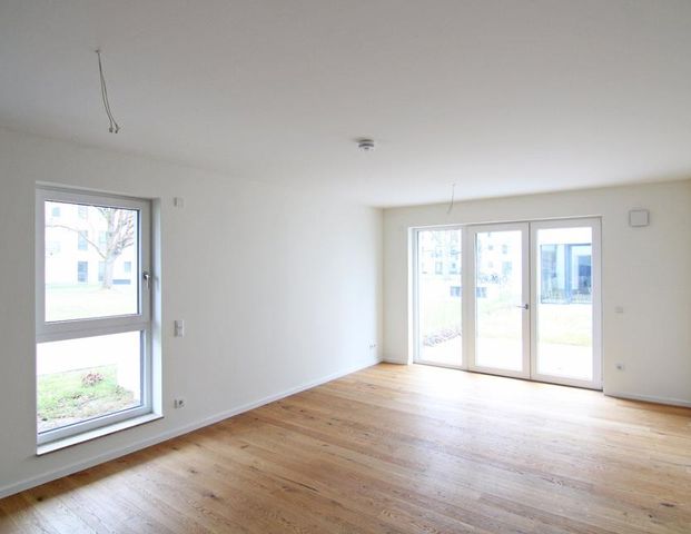 Terrassenwohnung mit großer Süd-Terrasse zum Verlieben: eleganter Erstbezug mit allen Extras! - Foto 1