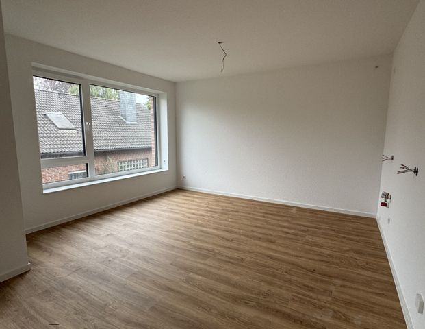 Dachgeschosswohnung in ruhiger Wohnsiedlung! - Foto 1