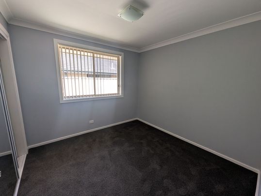 Comfortable Family Living with Entertainer's Appeal - Photo 1