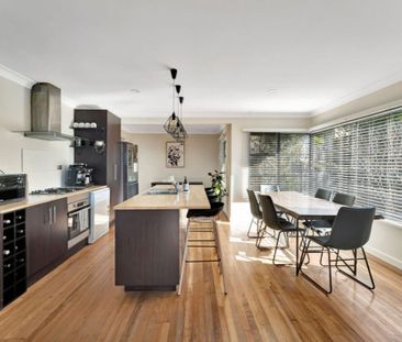 Fully renovated home with pleasant views & versatile spaces. - Photo 2