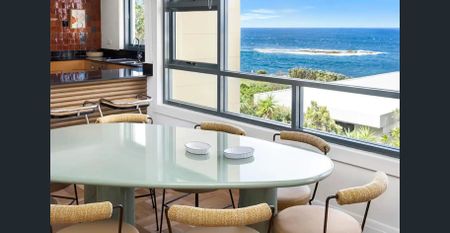 Furnished Coastal Oasis with Panoramic Views and Artistic Flair - Photo 5