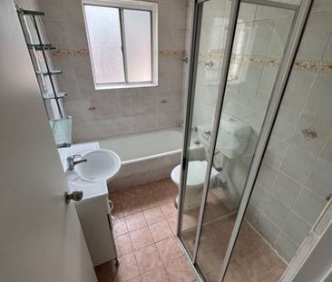 Fresh & Convenient 2-Bedroom Unit with Lock-Up Garage - Photo 6