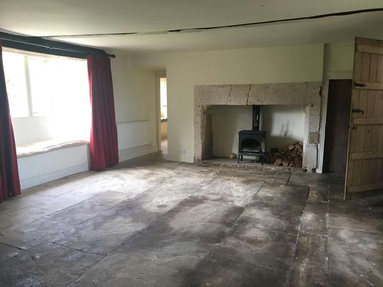 An imposing five-bedroom detached farmhouse on the edge of Neston village, blending original character with modern comforts, set within a large garden and offer - Photo 1