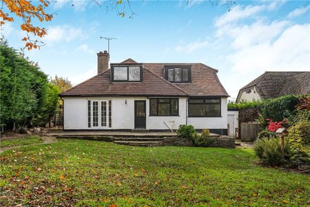 Pine Cottage is a detached family home in Chalfont St Giles, with a garage, ample driveway parking and a well established rear garden. - Photo 5